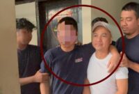 1763402052960-kedua-tersangka-pembunuhan-ahmad-dan-anaknya-inisial-ar-di-polman-saat-digelandang-polisi-1763384252714_169