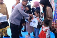 1765343289005-penyerahan-bantuan-tabungan-pendidikan-kepada-anak-anggota-polri-yang-gugur-dibunuh-kkb-papua-1765327049691_169