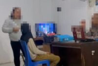 1765364868295-tangkapan-layar-momen-oknum-polisi-dan-istri-viral-diduga-intimidasi-warga-terkait-utang-1765356579164_169