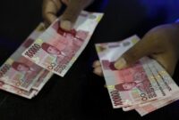 1765991434428-ilustrasi-uang_169