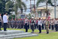 1766207422678-apel-gelar-pasukan-operasi-lilin-2025-di-mapolres-bitung-dalam-rangka-pengamanan-nataru-1766195880588_169