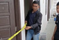 1769101682621-polisi-melakukan-olah-tkp-di-lokasi-penemuan-mayat-di-sebuah-kost-di-makassar-1769088300110_169