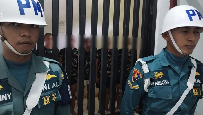 1769404071411-lima-oknum-anggota-tni-al-di-talaud-ditahan-denpom-usai-mengeroyok-guru-1769333805688_169